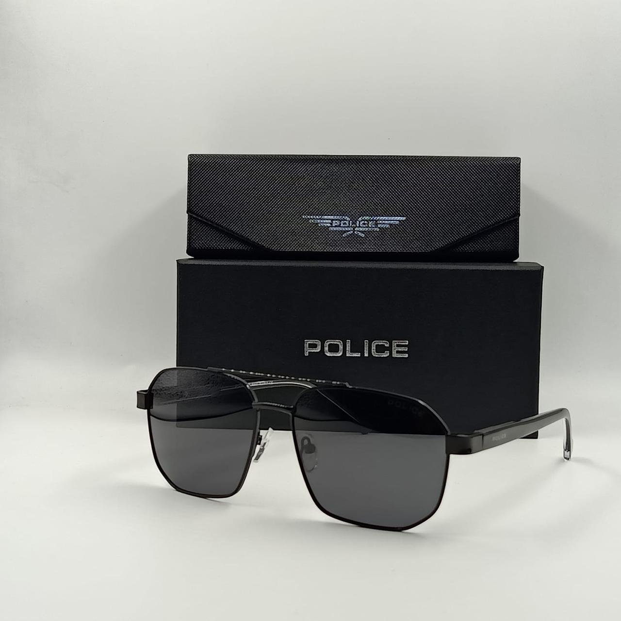 Lunettes de soleil POLICE  PL990 Noir