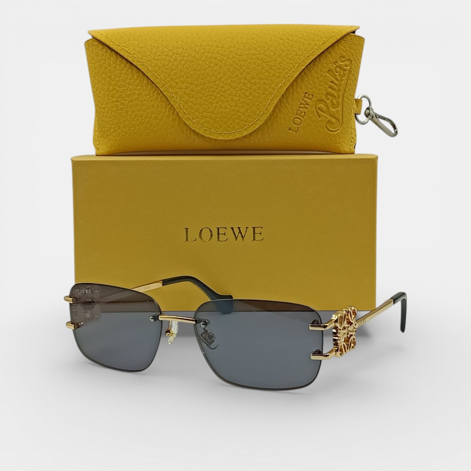 Lunettes de soleil Femme : LOEWE  LW9085 Noir