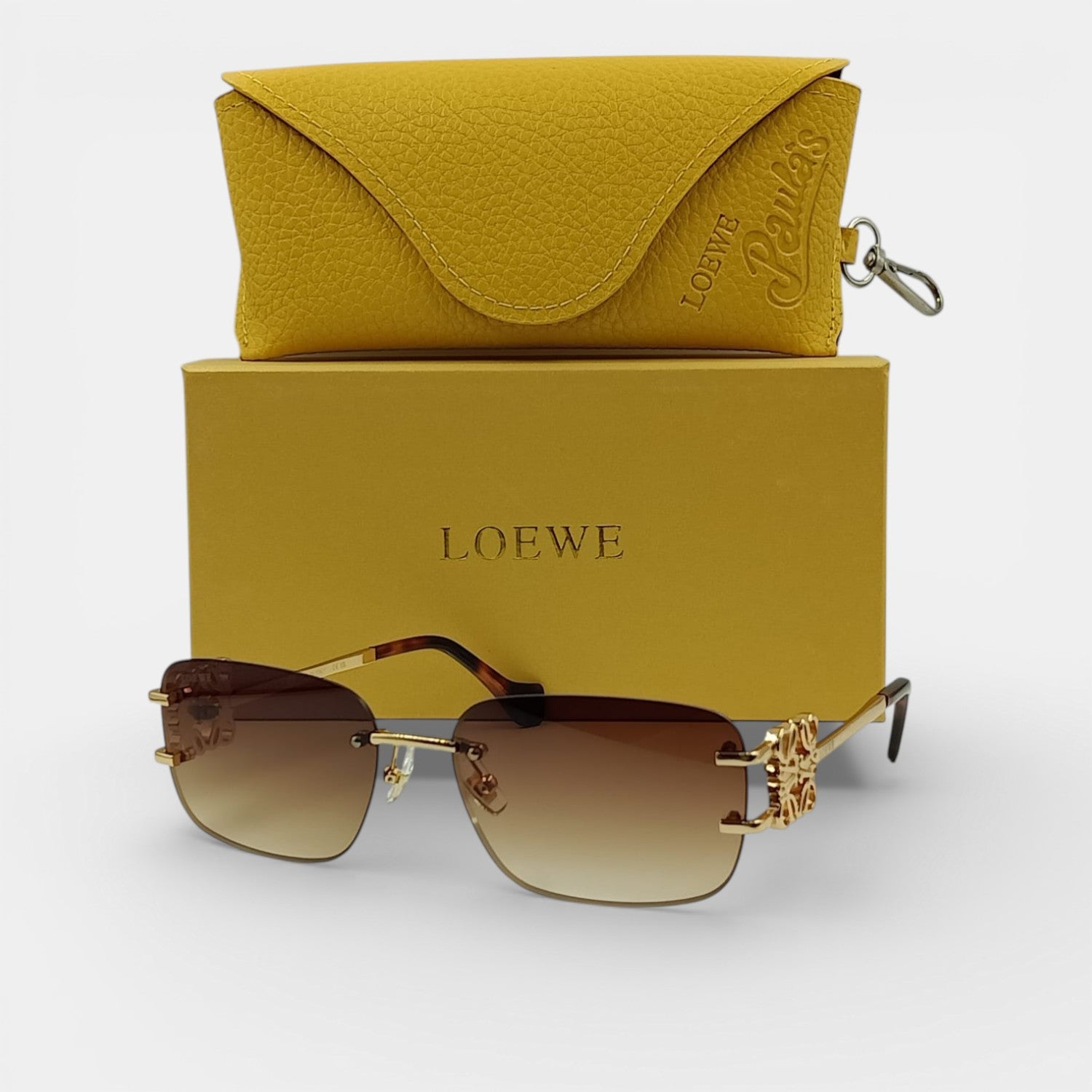 Lunettes de soleil Femme : LOEWE  LW9085 Marron