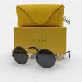 Lunettes de soleil Femme : LOEWE  LW9080 Noir