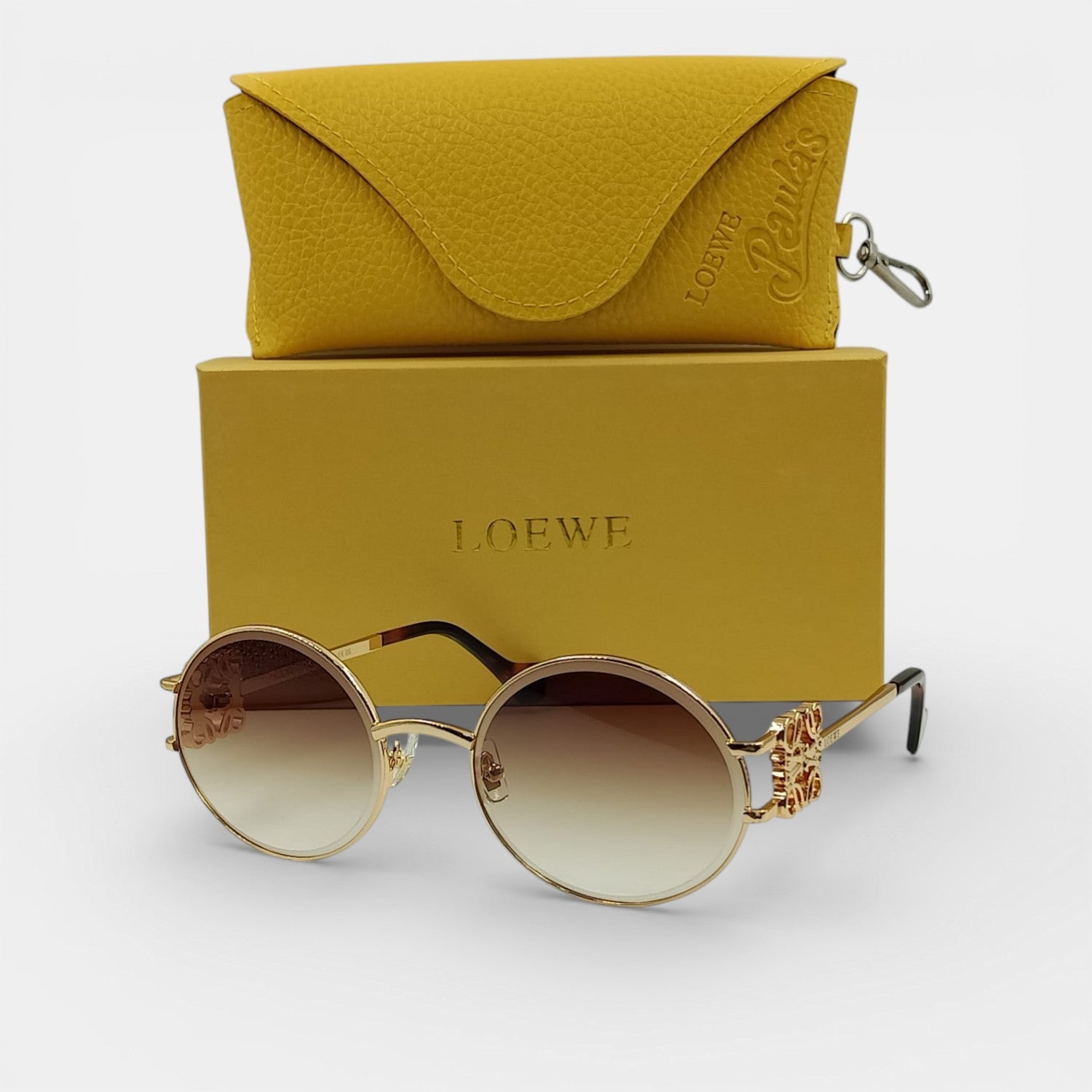 Lunettes de soleil Femme : LOEWE  LW9080 Marron