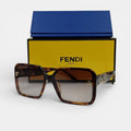 Lunettes de soleil Femme : FENDI  F7065 Marron Havane/Marron