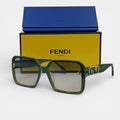 Lunettes de soleil Femme : FENDI  F7065 Vert oil