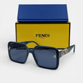 Lunettes de soleil Femme : FENDI  F7065 Bleu/Noir