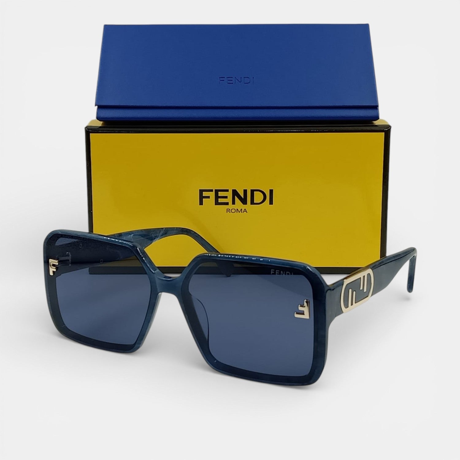 Lunettes de soleil Femme : FENDI  F7065 Bleu/Noir