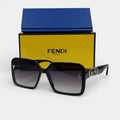 Lunettes de soleil Femme : FENDI  F7065 Noir/Noir