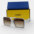 Lunettes de soleil Femme : FENDI  F7065 Marron/Blanc